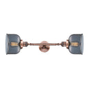 Bell Bath Vanity Light shown in the Antique Copper finish with a Plated Smoke shade