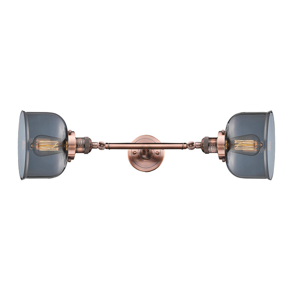 Bell Bath Vanity Light shown in the Antique Copper finish with a Plated Smoke shade