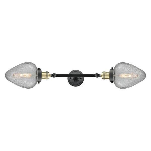 Geneseo Bath Vanity Light shown in the Black Antique Brass finish with a Clear Crackled shade