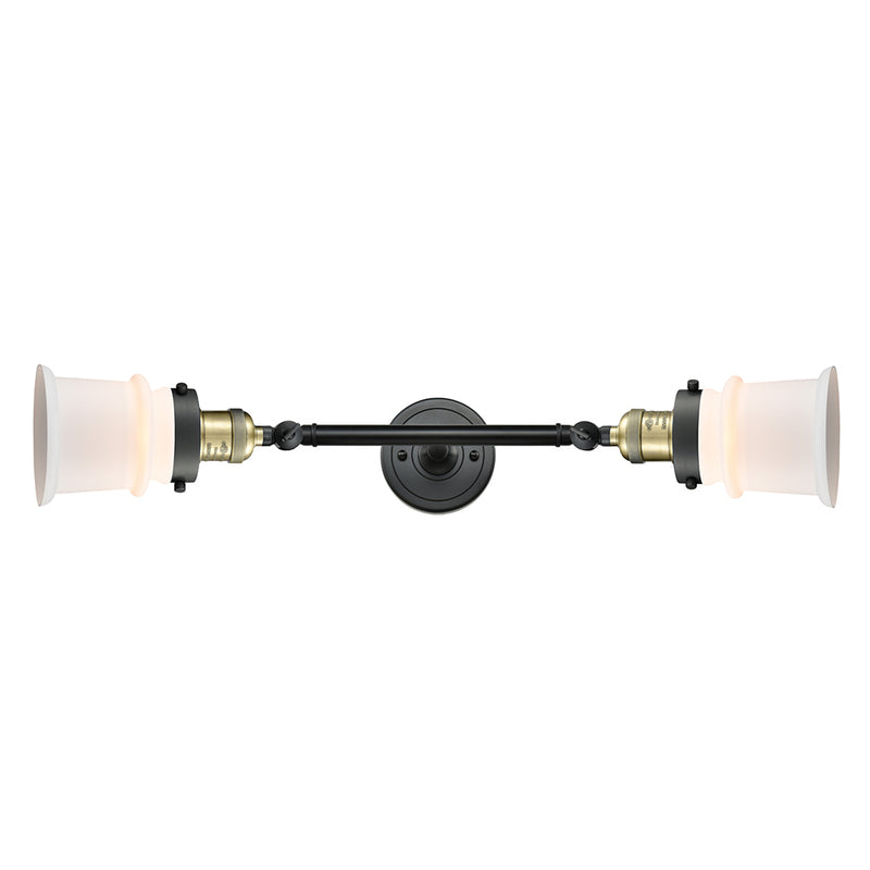 Canton Bath Vanity Light shown in the Black Antique Brass finish with a Matte White shade