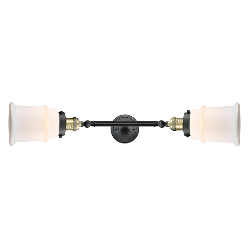 Canton Bath Vanity Light shown in the Black Antique Brass finish with a Matte White shade