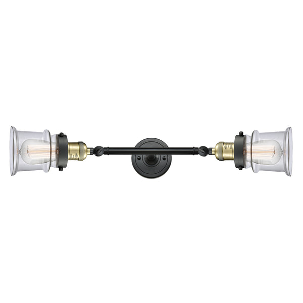 Canton Bath Vanity Light shown in the Black Antique Brass finish with a Clear shade