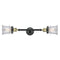 Canton Bath Vanity Light shown in the Black Antique Brass finish with a Clear shade