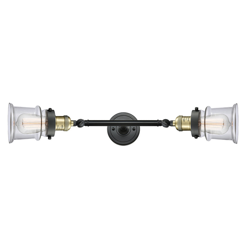 Canton Bath Vanity Light shown in the Black Antique Brass finish with a Clear shade