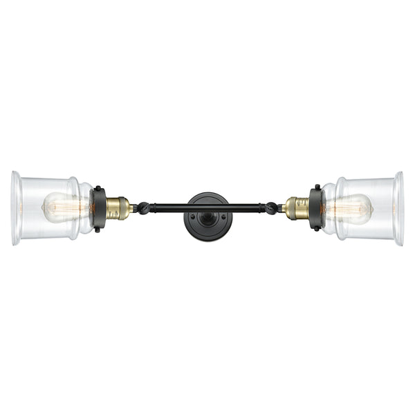 Canton Bath Vanity Light shown in the Black Antique Brass finish with a Clear shade