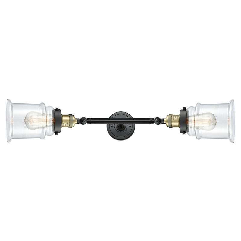 Canton Bath Vanity Light shown in the Black Antique Brass finish with a Clear shade