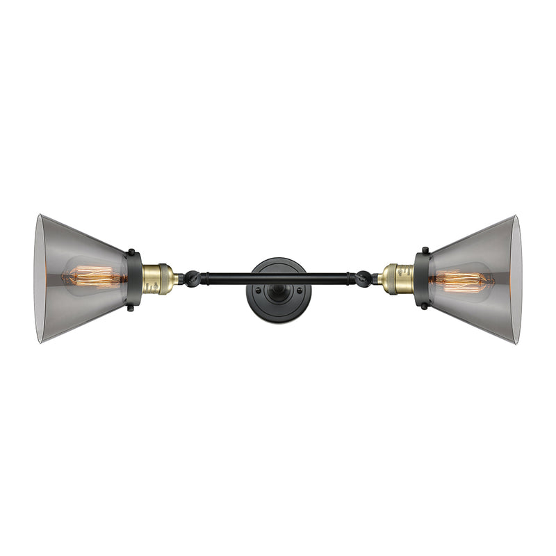 Cone Bath Vanity Light shown in the Black Antique Brass finish with a Plated Smoke shade