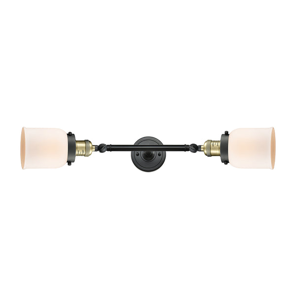 Bell Bath Vanity Light shown in the Black Antique Brass finish with a Matte White shade