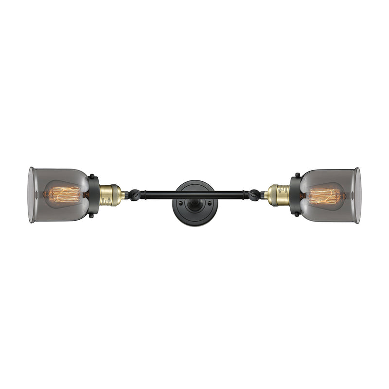 Bell Bath Vanity Light shown in the Black Antique Brass finish with a Plated Smoke shade