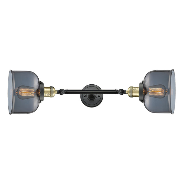 Bell Bath Vanity Light shown in the Black Antique Brass finish with a Plated Smoke shade
