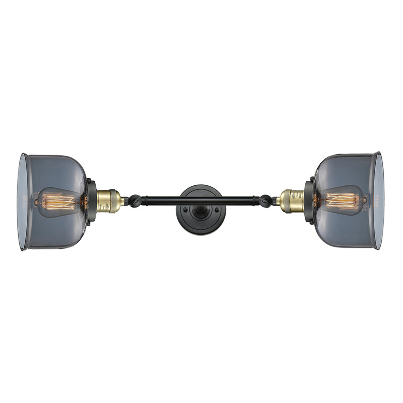 Bell Bath Vanity Light shown in the Black Antique Brass finish with a Plated Smoke shade