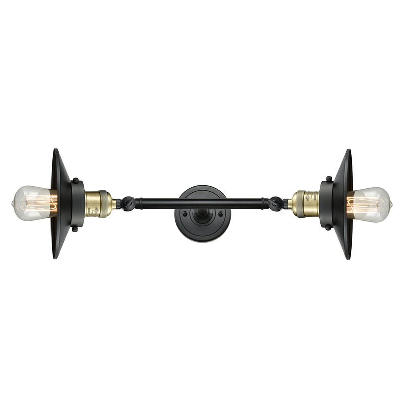 Railroad Bath Vanity Light shown in the Black Antique Brass finish with a Matte Black shade