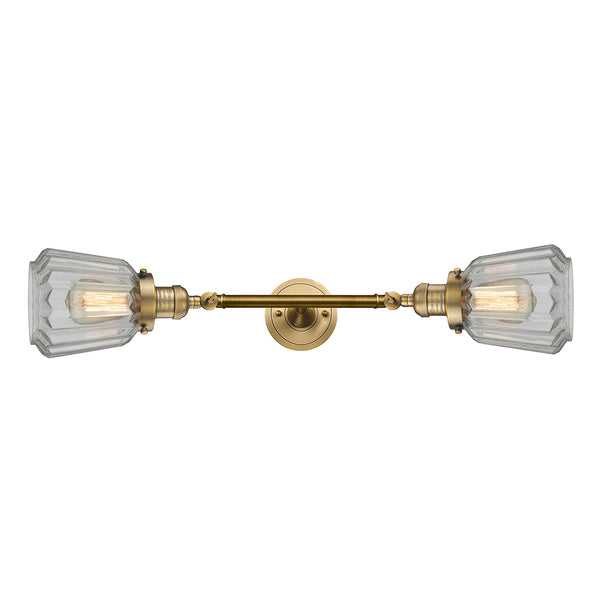 Chatham Bath Vanity Light shown in the Brushed Brass finish with a Clear shade