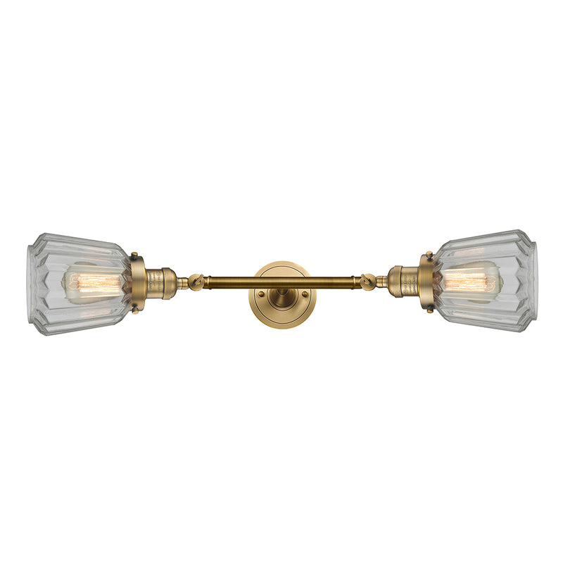 Chatham Bath Vanity Light shown in the Brushed Brass finish with a Clear shade