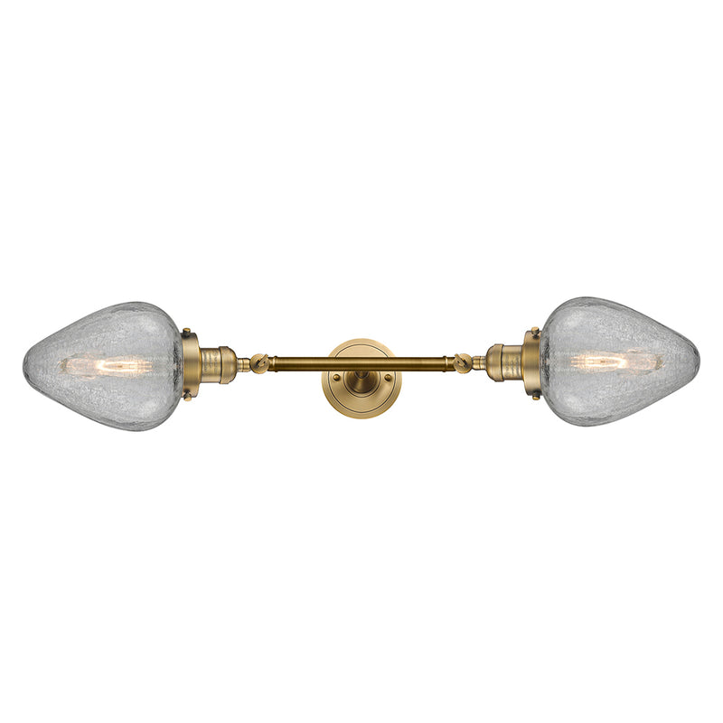 Geneseo Bath Vanity Light shown in the Brushed Brass finish with a Clear Crackled shade
