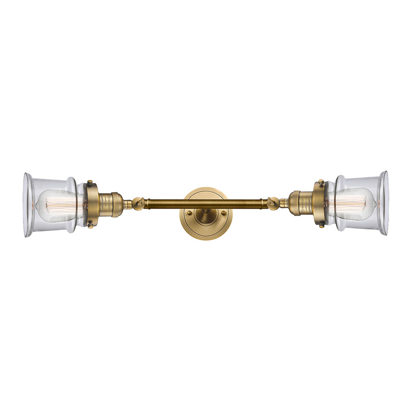 Canton Bath Vanity Light shown in the Brushed Brass finish with a Clear shade