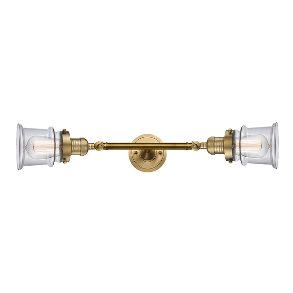 Canton Bath Vanity Light shown in the Brushed Brass finish with a Clear shade