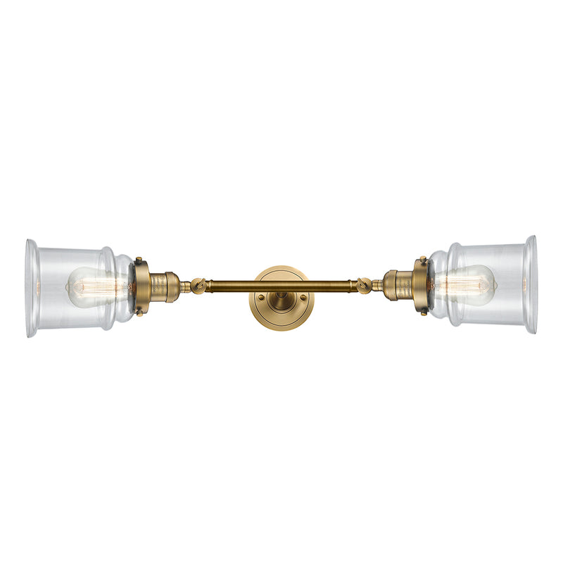 Canton Bath Vanity Light shown in the Brushed Brass finish with a Clear shade
