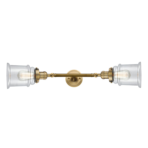 Canton Bath Vanity Light shown in the Brushed Brass finish with a Clear shade