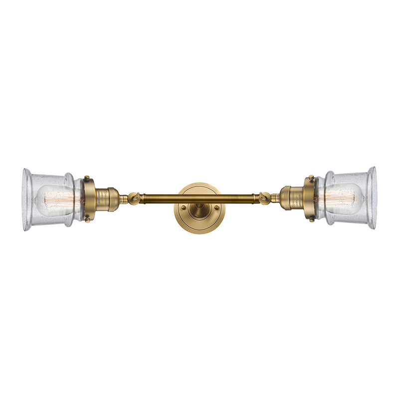 Canton Bath Vanity Light shown in the Brushed Brass finish with a Seedy shade
