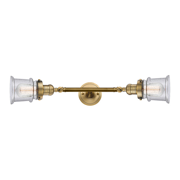 Canton Bath Vanity Light shown in the Brushed Brass finish with a Seedy shade