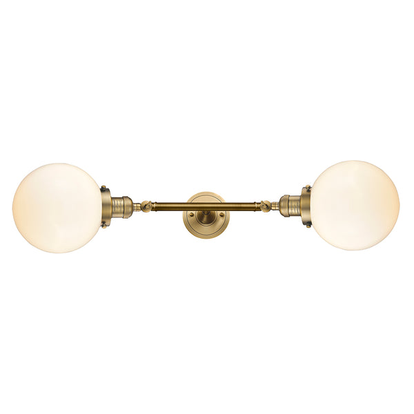 Beacon Bath Vanity Light shown in the Brushed Brass finish with a Matte White shade