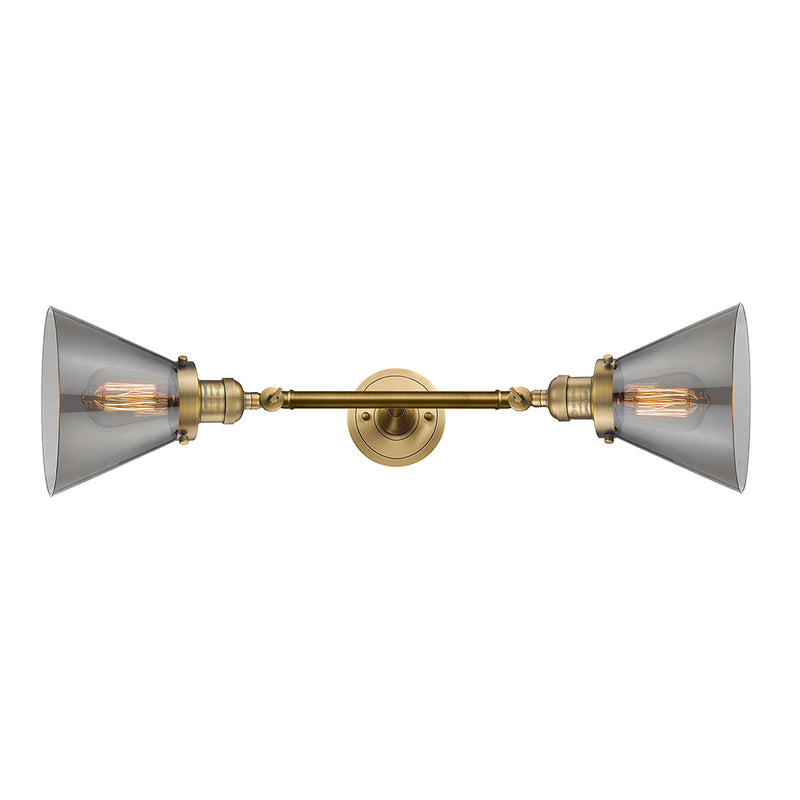 Cone Bath Vanity Light shown in the Brushed Brass finish with a Plated Smoke shade