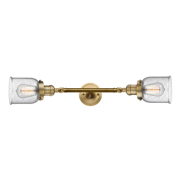 Bell Bath Vanity Light shown in the Brushed Brass finish with a Seedy shade