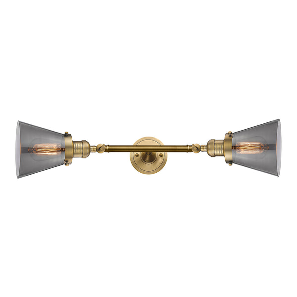 Cone Bath Vanity Light shown in the Brushed Brass finish with a Plated Smoke shade