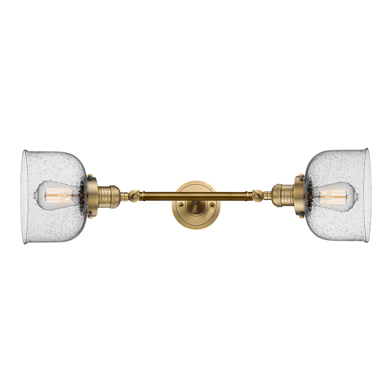 Bell Bath Vanity Light shown in the Brushed Brass finish with a Seedy shade