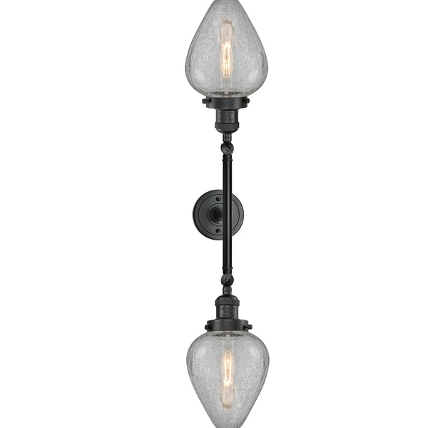 Geneseo Bath Vanity Light shown in the Matte Black finish with a Clear Crackled shade