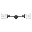 Canton Bath Vanity Light shown in the Matte Black finish with a Clear shade