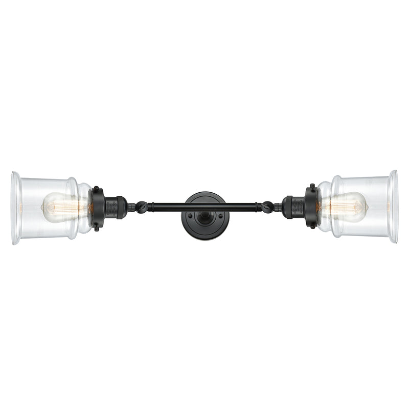 Canton Bath Vanity Light shown in the Matte Black finish with a Clear shade