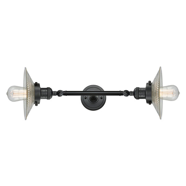 Halophane Bath Vanity Light shown in the Matte Black finish with a Clear Halophane shade