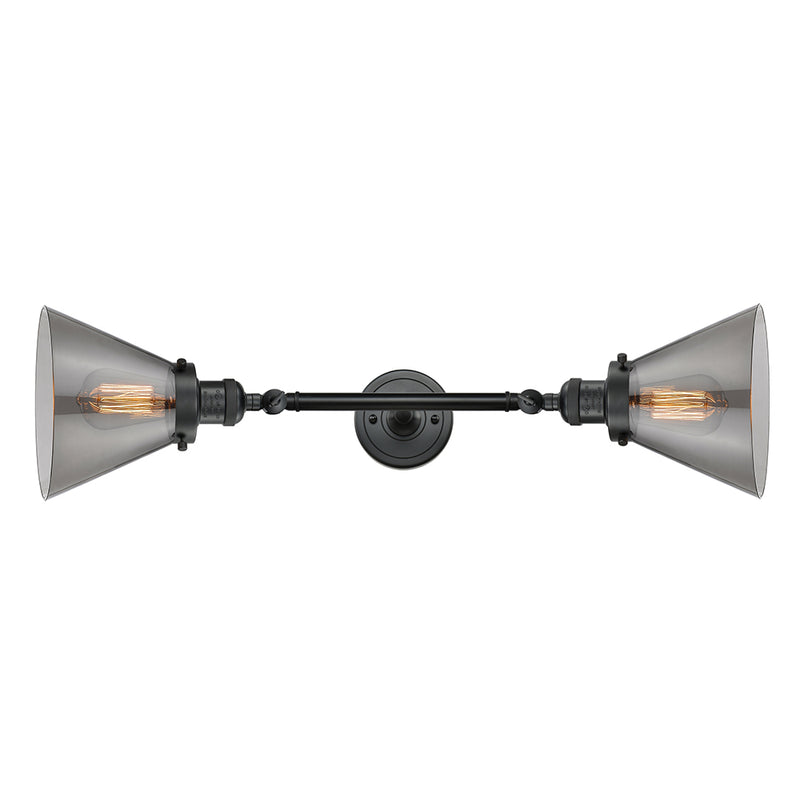 Cone Bath Vanity Light shown in the Matte Black finish with a Plated Smoke shade