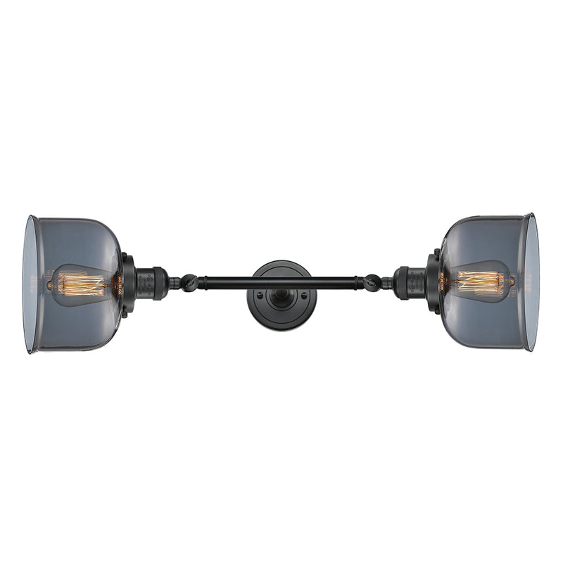 Bell Bath Vanity Light shown in the Matte Black finish with a Plated Smoke shade