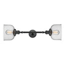 Bell Bath Vanity Light shown in the Matte Black finish with a Seedy shade