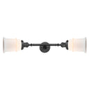 Canton Bath Vanity Light shown in the Oil Rubbed Bronze finish with a Matte White shade