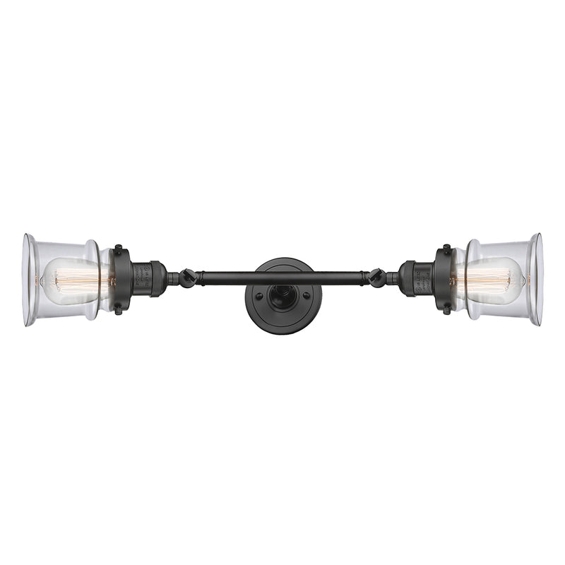 Canton Bath Vanity Light shown in the Oil Rubbed Bronze finish with a Clear shade