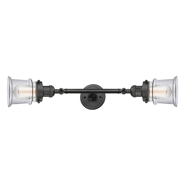 Canton Bath Vanity Light shown in the Oil Rubbed Bronze finish with a Clear shade