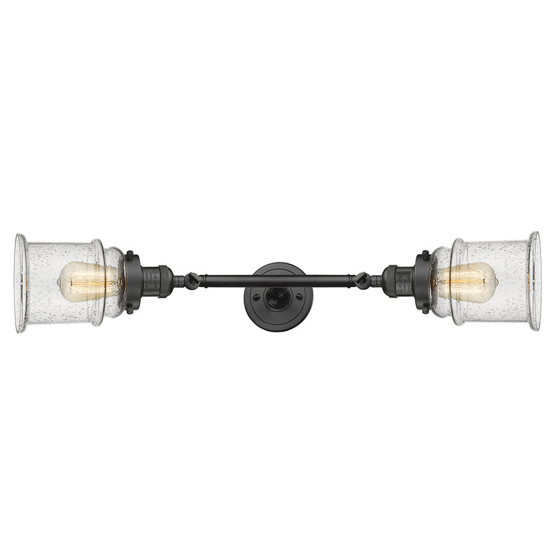 Canton Bath Vanity Light shown in the Oil Rubbed Bronze finish with a Seedy shade