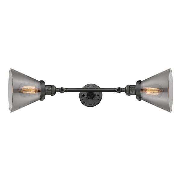 Cone Bath Vanity Light shown in the Oil Rubbed Bronze finish with a Plated Smoke shade