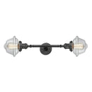 Oxford Bath Vanity Light shown in the Oil Rubbed Bronze finish with a Clear shade