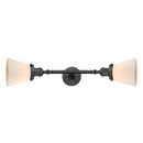 Cone Bath Vanity Light shown in the Oil Rubbed Bronze finish with a Matte White shade