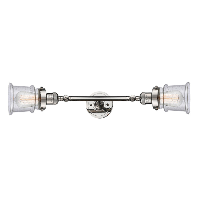 Canton Bath Vanity Light shown in the Polished Nickel finish with a Seedy shade