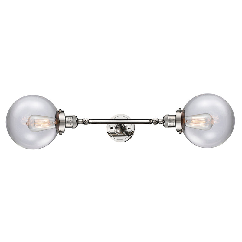 Beacon Bath Vanity Light shown in the Polished Nickel finish with a Clear shade