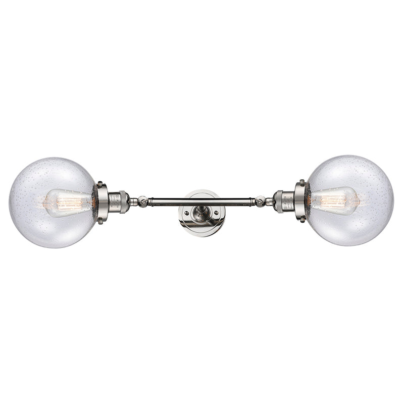 Beacon Bath Vanity Light shown in the Polished Nickel finish with a Seedy shade