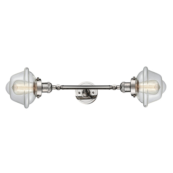 Oxford Bath Vanity Light shown in the Polished Nickel finish with a Clear shade