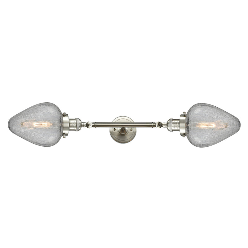 Geneseo Bath Vanity Light shown in the Brushed Satin Nickel finish with a Clear Crackled shade