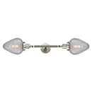 Geneseo Bath Vanity Light shown in the Brushed Satin Nickel finish with a Clear Crackled shade